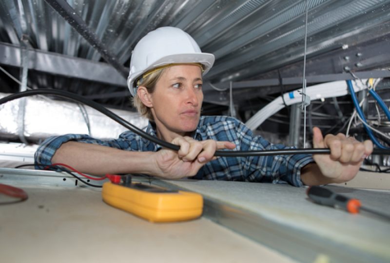Female,Electrician,Working,In,Confined,Space